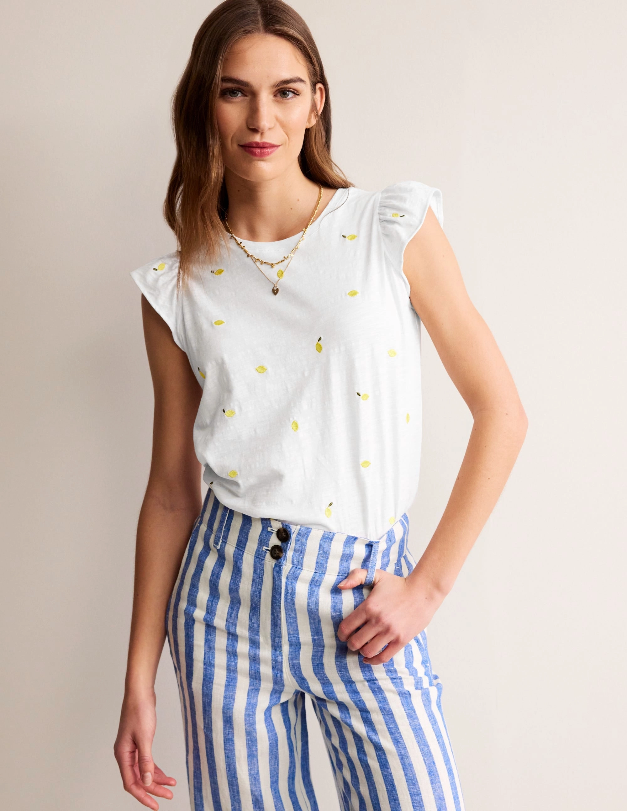 Dora Flutter Sleeve Top-White, Lemons Flexible Knit FrictionReducing