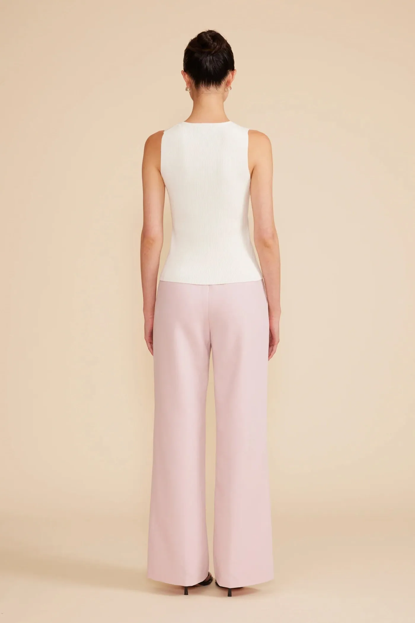 ERIS WHITE KNIT VEST Fade Resistant Treatment