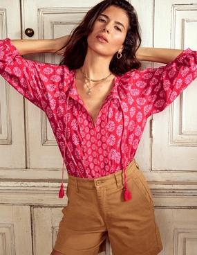 Compression Fit Technology Blouson Sleeve Raglan Top-Posy Stamp